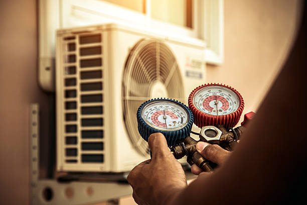 Professional Heat Pump Repair technician working in Martindale, TX
